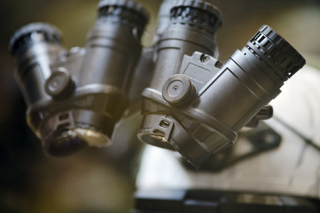 Army binoculars with night vision on a soldier's helmet. Optical device on a military helmet for tracking in warの写真素材