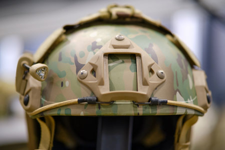 The army clothing store showcases the khaki helmet that forms part of the soldier's military uniform.の写真素材