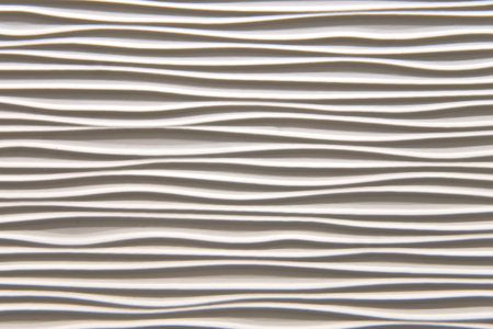 Texture of wavy lines of an abstract geometric shape surface, background