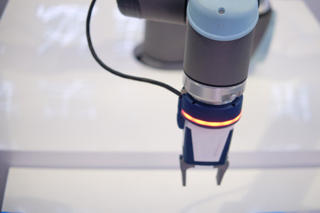 Close-up of modern robot arm. Technology and innovation concept.の写真素材