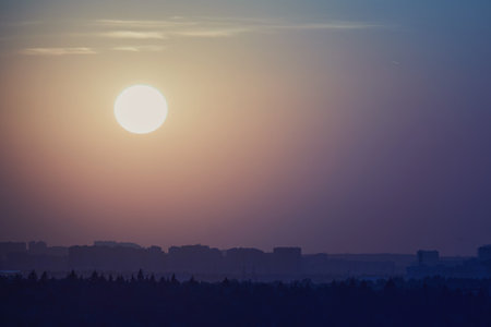 The dawn sky was painted with the blue colors of the sunrise.の写真素材