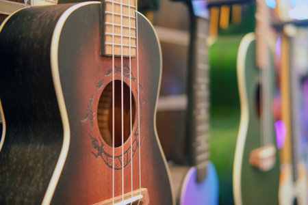 Ukulele in a music store. Close-up red guitar - Moscow, Russia, September 20, 2023のeditorial素材