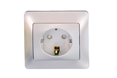Electrical outlet on a gray wall background, closeup of photo, isolated on white backgroundの写真素材
