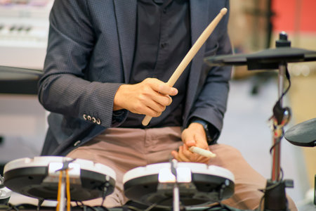 Musician playing drums in the studio. Close-up of hands.の写真素材