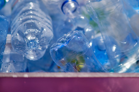 Plastic bottles of water are stored in a recycling centerの写真素材
