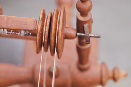 The retro design of the spinning wheel adds a vintage touch to the craft roomの写真素材