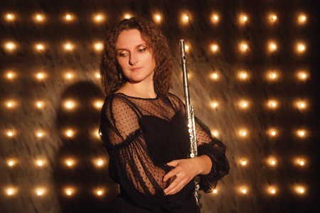 Musician with a flute delighted the crowd with her performance under the bright lights.