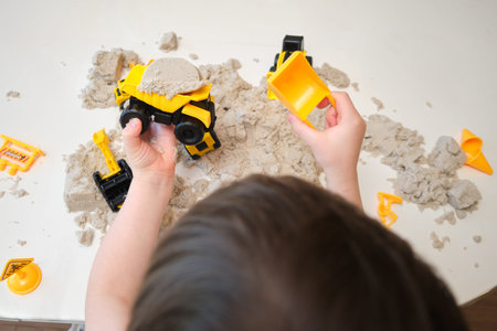 Kinetic sand provides hours of entertainment as the baby builds creative models at the table. Kid...