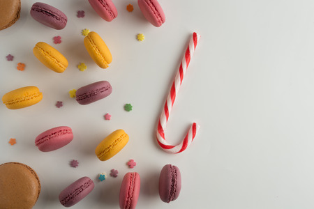Cake macaron or macaroon on white background from above, colorful almond cookies, top view.の写真素材