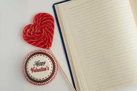 Happy Valentine's Day. Caramel heart on white background, congratulations on Valentine's Day. To-do list for Valentine's dayの写真素材