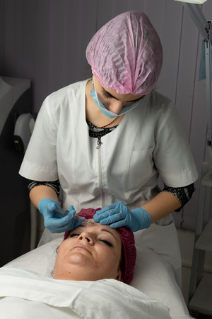 Rejuvenating treatments anti-wrinkle and creases, injection of youthの写真素材