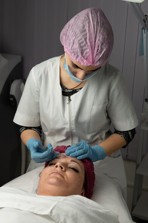 Rejuvenating treatments anti-wrinkle and creases, injection of youthの写真素材