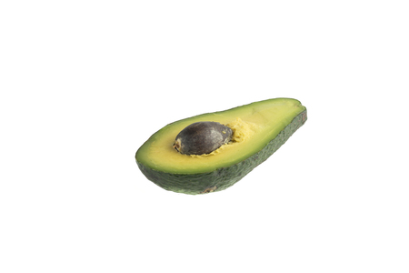 a green avocado on a isolated backgroundの写真素材