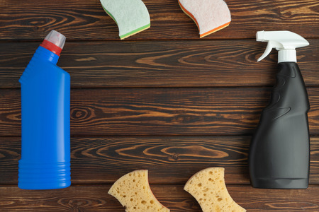 Set of tools for cleaning the house, disinfectants on a dark backgroundの写真素材