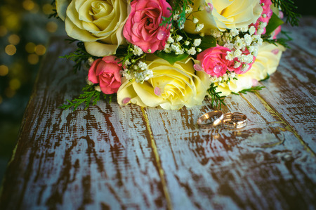 bridal bouquet and newlyweds rings.の写真素材