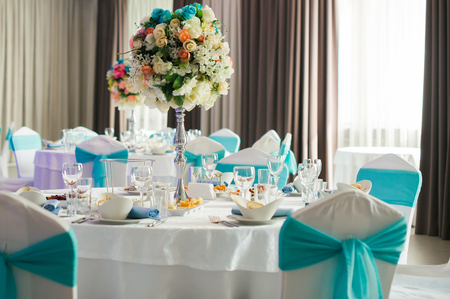 Serving wedding table. covered with a festive round tableの写真素材