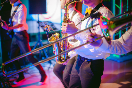 musician plays the saxophone performance at a concertの写真素材
