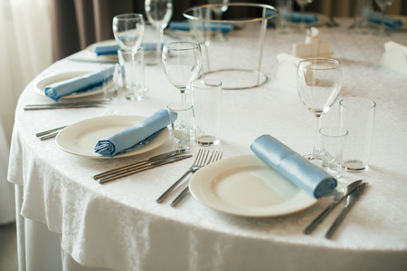 Serving wedding table. covered with a festive round tableの写真素材