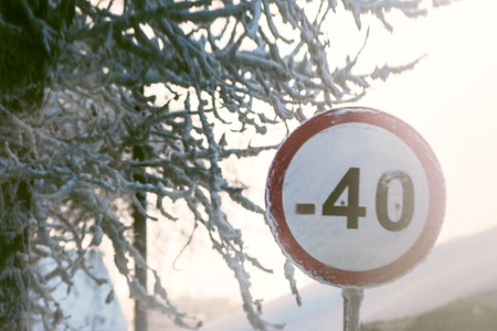 road sign -40 degrees cold, sunny cold winter dayの写真素材