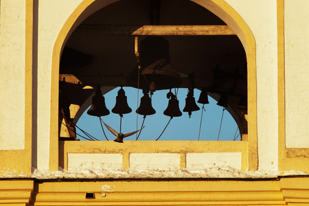 dove takes off from the church bell belfryの写真素材