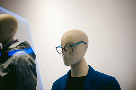 dummy on a shop window. Faceless man's glassesの写真素材