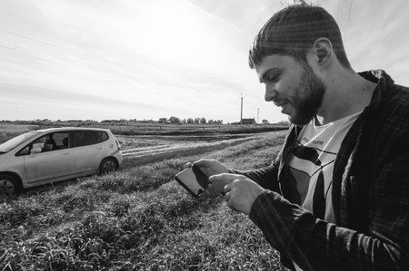 man on a background of landscape fields, wheatの写真素材