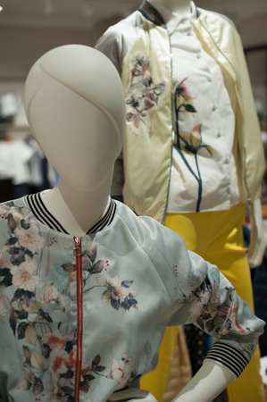 Mannequins in a women's clothing store in a shopping centerの写真素材