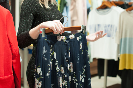 outfits in a women's clothing store in a shopping centerの写真素材