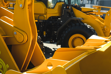 Excavator Loader Machine. Side View of Front Hoe Loader. Industrial Vehicle. Heavy Construction Equipment Machine. Pneumatic Truck.の写真素材