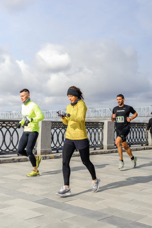 Russia, Novosibirsk - December 14, 2019: Spring Run on the Quay. group of people participate in a...