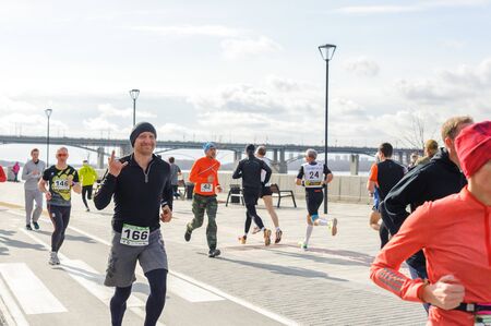 Russia, Novosibirsk - December 14, 2019: Spring Run on the Quay. group of people participate in a sports eventのeditorial素材
