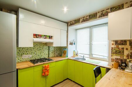 Russia, Moscow- June 17, 2018: interior room apartment. standard repair decoration in hostel. kitchen and dining roomのeditorial素材