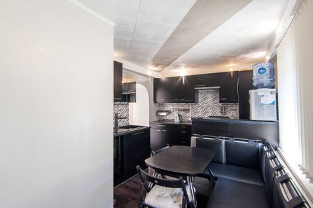 Russia, Moscow- June 23, 2018: interior room apartment. standard repair decoration in hostel. kitchen and dining roomのeditorial素材