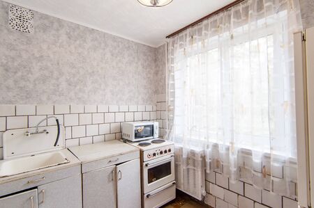 Russia, Moscow- May 16, 2019: interior room apartment. standard repair decoration in hostel. kitchen and dining roomのeditorial素材