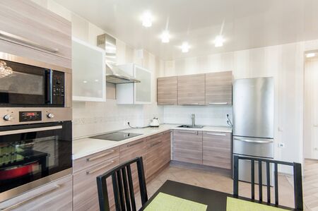 Russia, Moscow- May 29, 2019: interior room apartment. standard repair decoration in hostel. kitchen and dining roomのeditorial素材