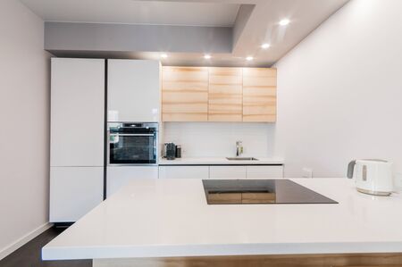 Russia, Moscow- July 02, 2019: interior room apartment. standard repair decoration in hostel. modern kitchen, dining areaのeditorial素材