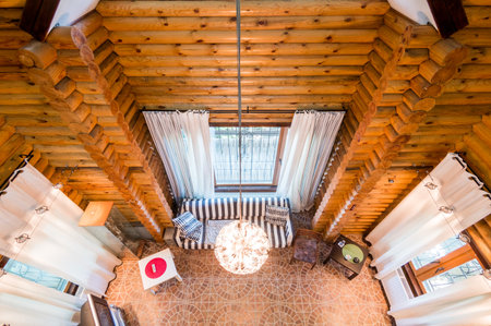 Russia, Moscow- July 06, 2019: interior room apartment. beautiful designer country house with wooden elements. top view of living roomのeditorial素材