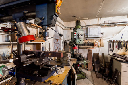Russia, Moscow- July 06, 2019: interior machines in garage workshop. old machinery repair and...