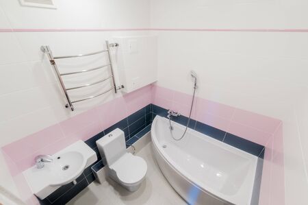 Russia, Moscow- July 16, 2019: interior room apartment. standard repair decoration in hostel. bathroom, sink, decoration elements, toiletのeditorial素材