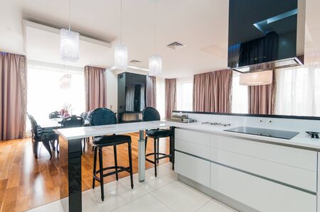 Russia, Moscow- July 21, 2019: interior room apartment. standard repair decoration in hostel. modern bright beautiful room. kitchen and diningのeditorial素材