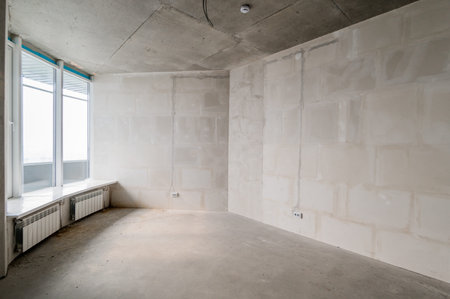 Russia, Moscow- July 16, 2019: interior room. rough repair for self-finishing. interior decoration, bare walls of the room, stage of constructionのeditorial素材