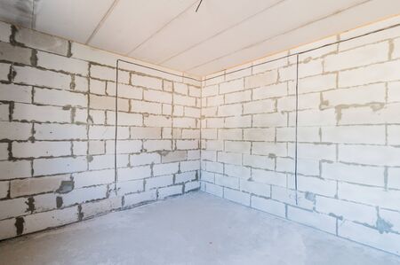 Russia, Moscow- July 25, 2019: interior room apartment. rough repair for self-finishing. interior decoration, bare walls of the room, stage of constructionのeditorial素材