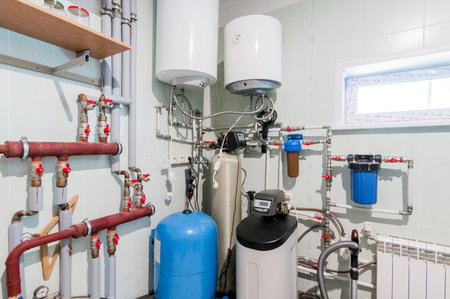 Russia, Omsk- August 02, 2019: interior boiler room. heating system, pipes and appliancesのeditorial素材