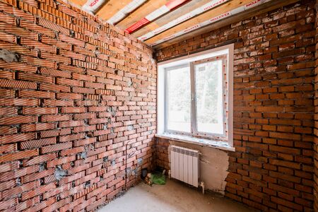 Russia, Moscow- July 23, 2019: interior room apartment. rough repair for self-finishing. interior decoration, bare walls of the room, stage of constructionのeditorial素材
