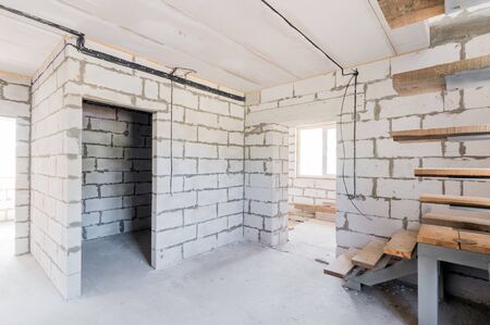 Russia, Moscow- July 25, 2019: interior room apartment. rough repair for self-finishing. interior decoration, bare walls of the room, stage of constructionのeditorial素材