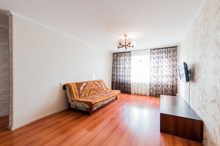 Russia, Omsk- August 02, 2019: interior room apartment. standard repair decoration in hostelのeditorial素材