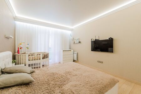 Russia, Moscow- August 05, 2019: interior room apartment modern bright cozy atmosphere. general cleaning, home decoration, preparation of house for sale. bedroom with bedのeditorial素材