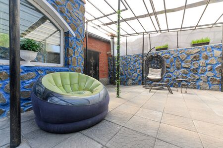 Russia, Moscow- September 08, 2019: interior room apartment closed recreation area in the courtyard of a private houseのeditorial素材