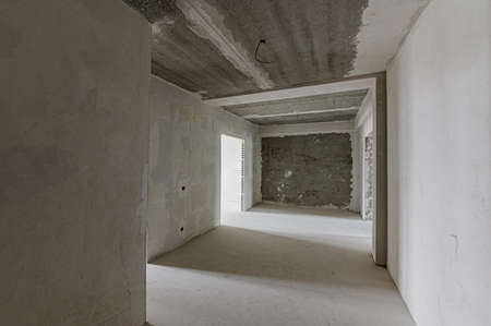 Russia, Moscow- December 15, 2019: interior room rough repair for self-finishing. interior decoration, bare walls of the room, stage of constructionのeditorial素材