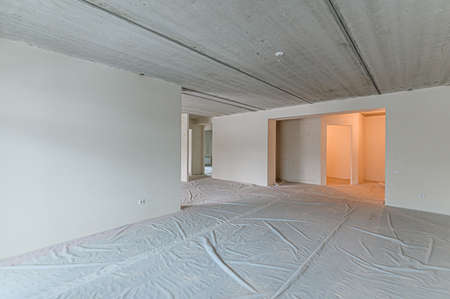 Russia, Moscow- January 27, 2020: interior room apartment rough repair for self-finishing. interior decoration, bare walls of the room, stage of constructionのeditorial素材